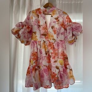 The Impeccable Pig dress. Floral with pearl button. Size Medium.